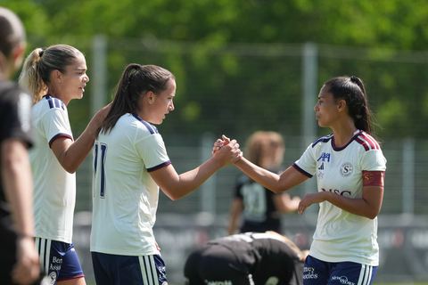 Crans-Montana, Switzerland - July 25: Daina Bourma (3 SFCCF) celebrates with Magdalena Izabela Sobal (11 SFCCF) after a goal during the AXA Women's Super League match between Servette FC Chenois Feminin and FC Sion Feminin at Stade du Christ-Roi on July 25, 2026 in Crans-Montana, Switzerland.