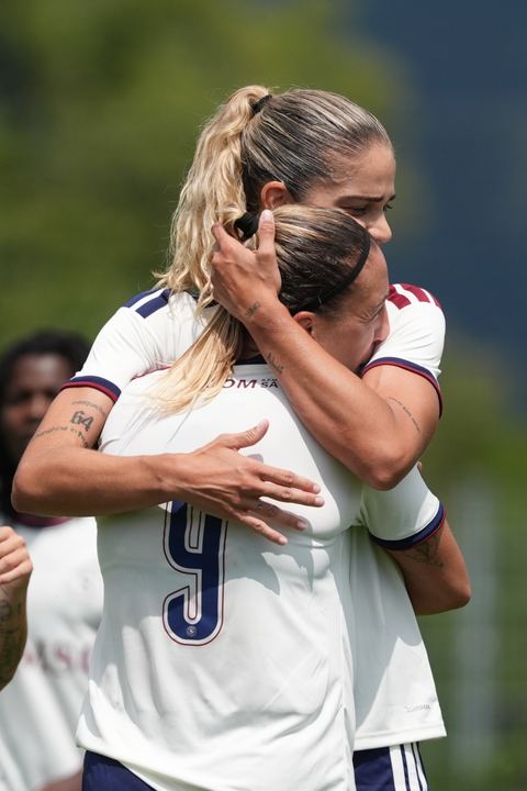 Crans-Montana, Switzerland - July 25: De al m da Eira Stefanie (64 SFCCF) celebrates with Gloria Marinelli (9 SFCCF) during the AXA Women's Super League match between Servette FC Chenois Feminin and FC Sion Feminin at Stade du Christ-Roi on July 25, 2026 in Crans-Montana, Switzerland.